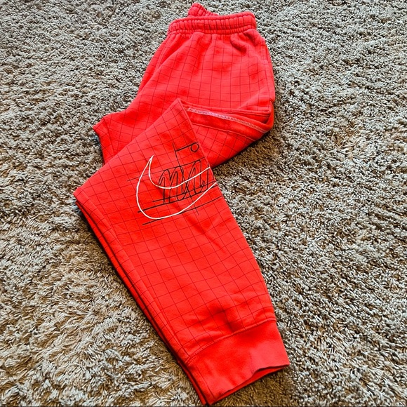 Nike Other - Nike Grid patterned red joggers